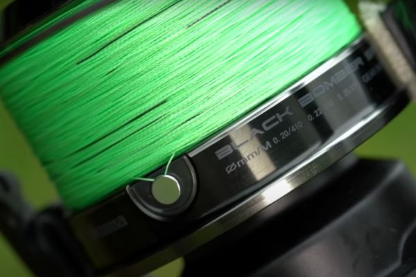A solid line clip on a spod reel A solid line clip on a spod reel